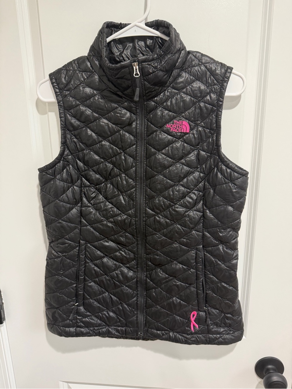 The North Face thermoball Black Quilted gilet with Pink Logo